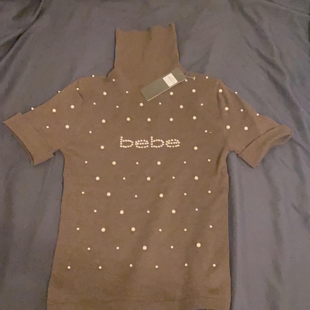 Beautiful new brown bebe turtleneck sweater